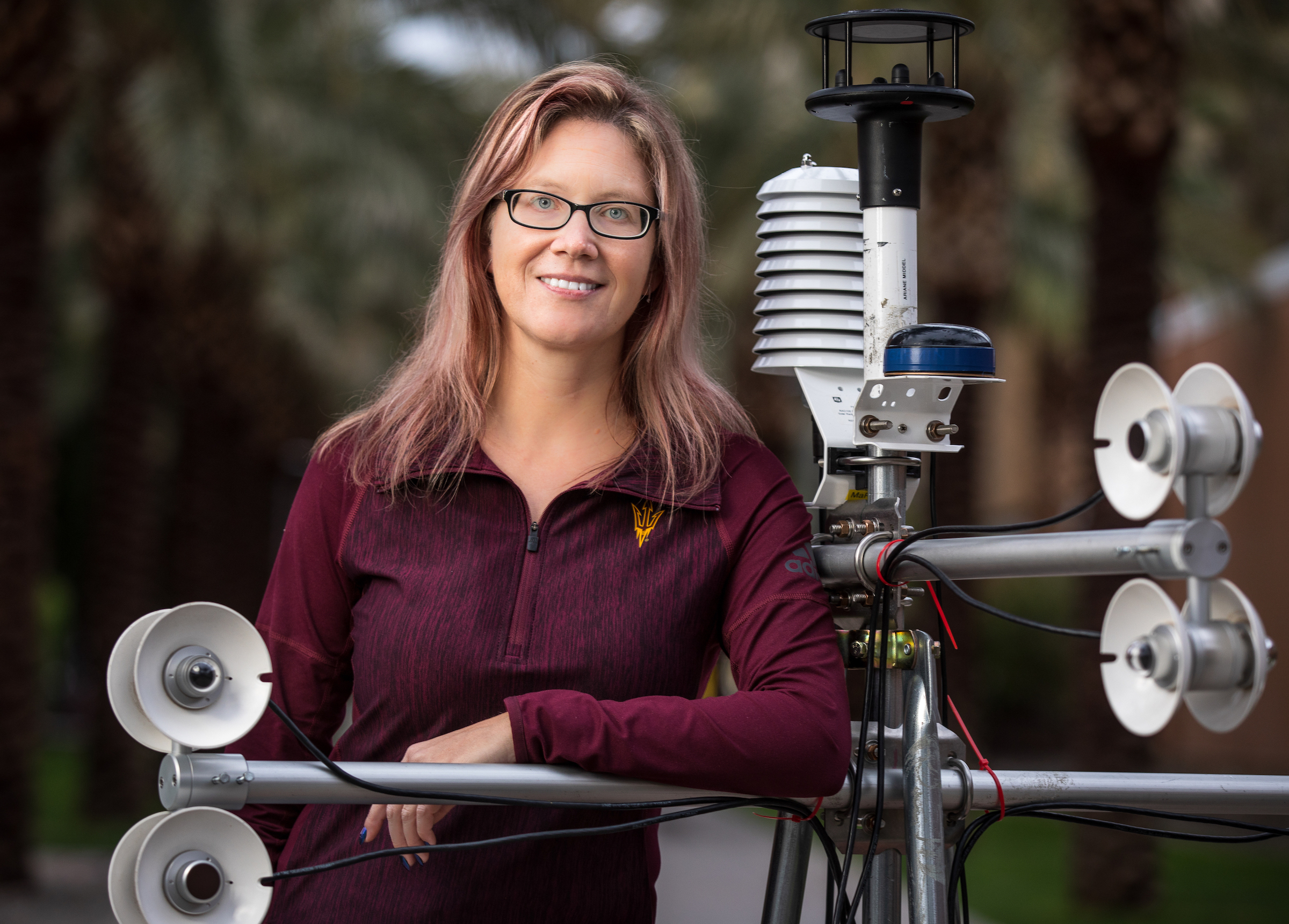 TEMPE - March 11, 2020 - ASU Now - Expert Ariane Middel - Assistant Professor Ariane Middel, posing with her biometerological MaRTy cart, focuses her research in the interdisciplinary field of urban climate with focus on climate-sensitive urban form, design, landscapes, and infrastructure in the face of extreme heat and climatic uncertainty. For the past six years, Middel has advanced the field of urban climate science through applied and solutions-oriented research employing quantitative and qualitative field observations, local and microscale climate modeling, and geovisualization to investigate sustainability challenges related to heat, thermal comfort, Urban Heat Islands, water use, energy use, and human-climate interactions in cities. Photo by Charlie Leight/ASU Now